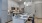 a kitchen with white cabinets
